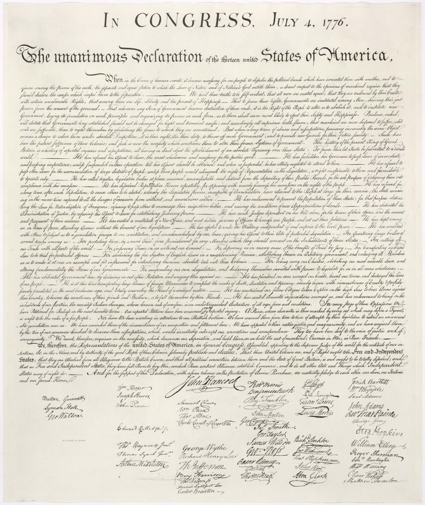 United States Declaration of Independence document on parchment, laid flat and photographed in even, neutral light to emphasize the texture of the paper and the legible calligraphic script, without any people or additional objects in the frame.
